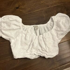 cute crop twist the the front and ties in the back!